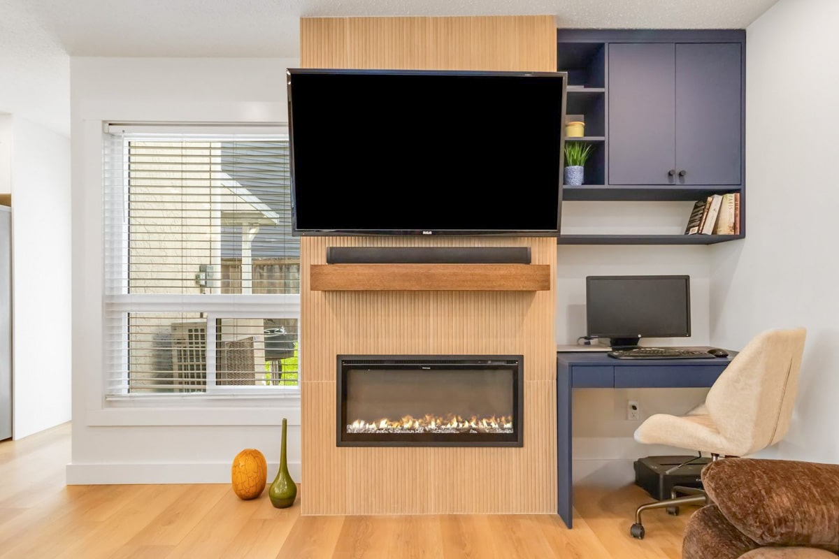 Modern living room with fireplace and TV