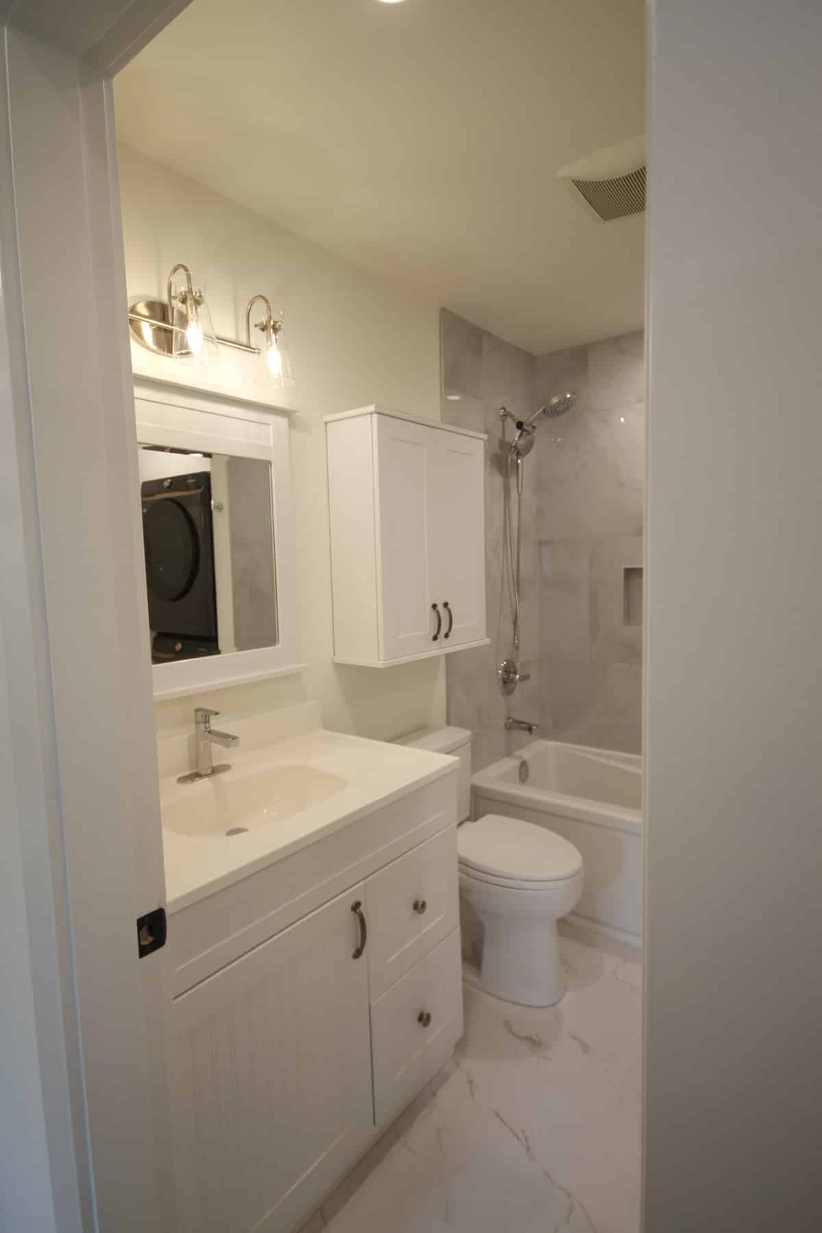 Modern bathroom with white fixtures