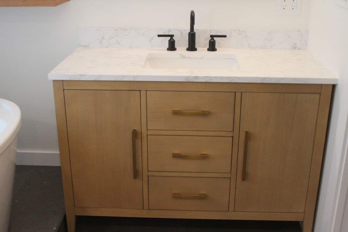 Modern bathroom vanity with sink.