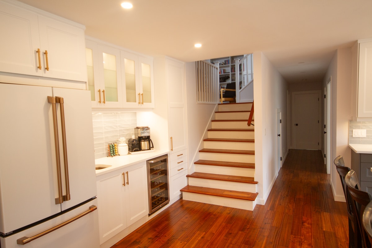 Modern kitchen with wooden stairs