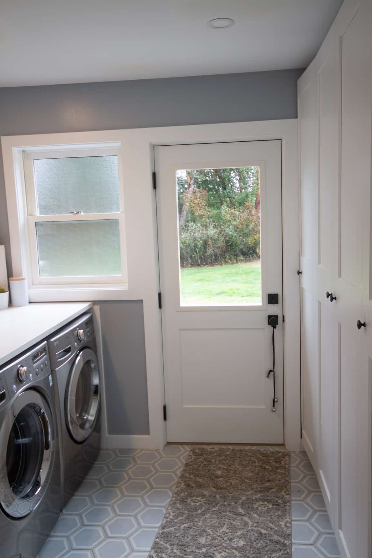 Modern laundry room with door