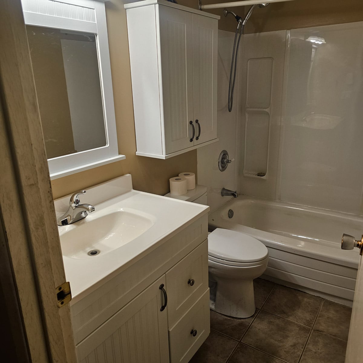 Clean, modern bathroom with fixtures.