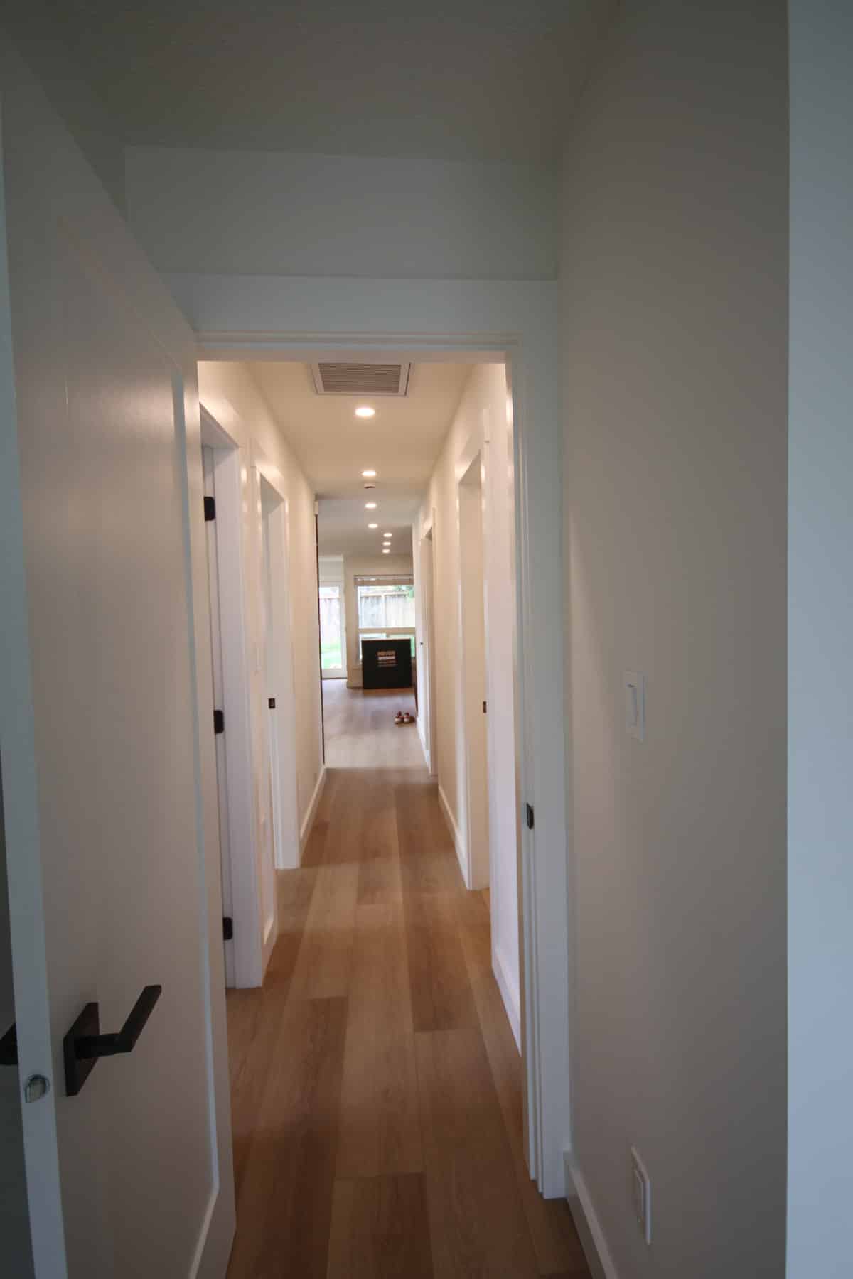 Bright, modern hallway with doors